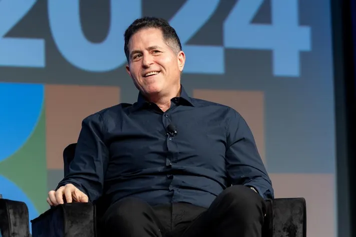 Michael Dell and George Soros